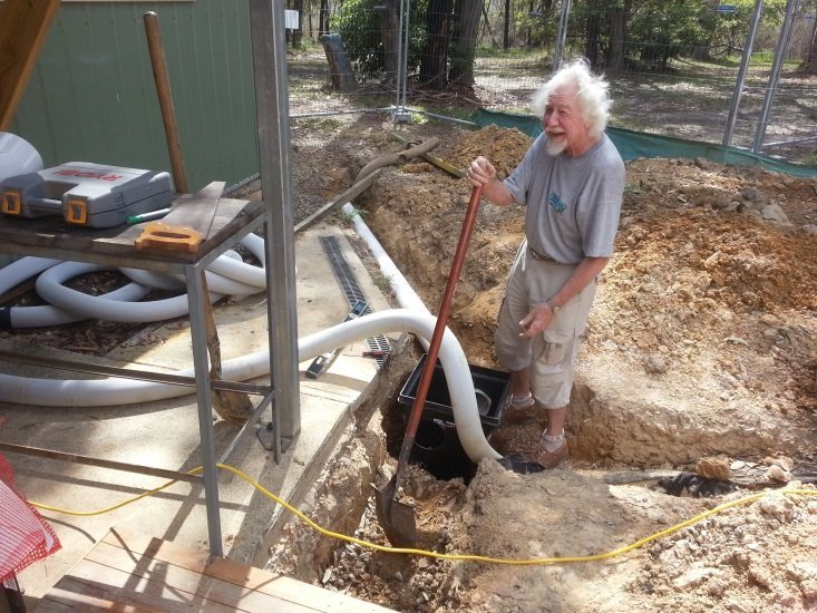 Shed member installing eco stormwater drainage during Block B construction